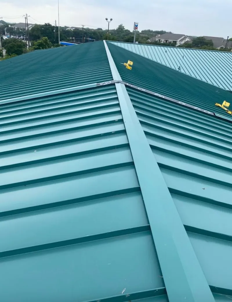Green commercial metal roof ridge and valley for Metal Roof Repair in Two Rivers