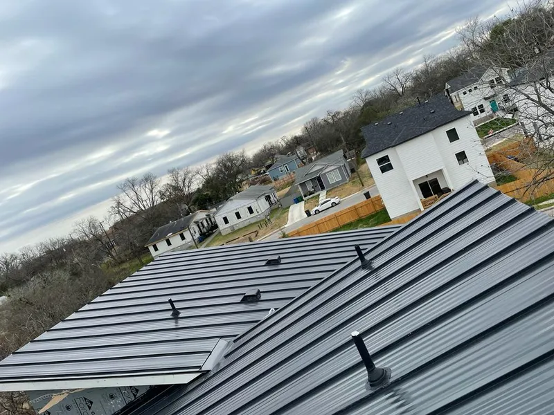 Standing seam metal roof panels with vents for Skylight Repair in Two Rivers